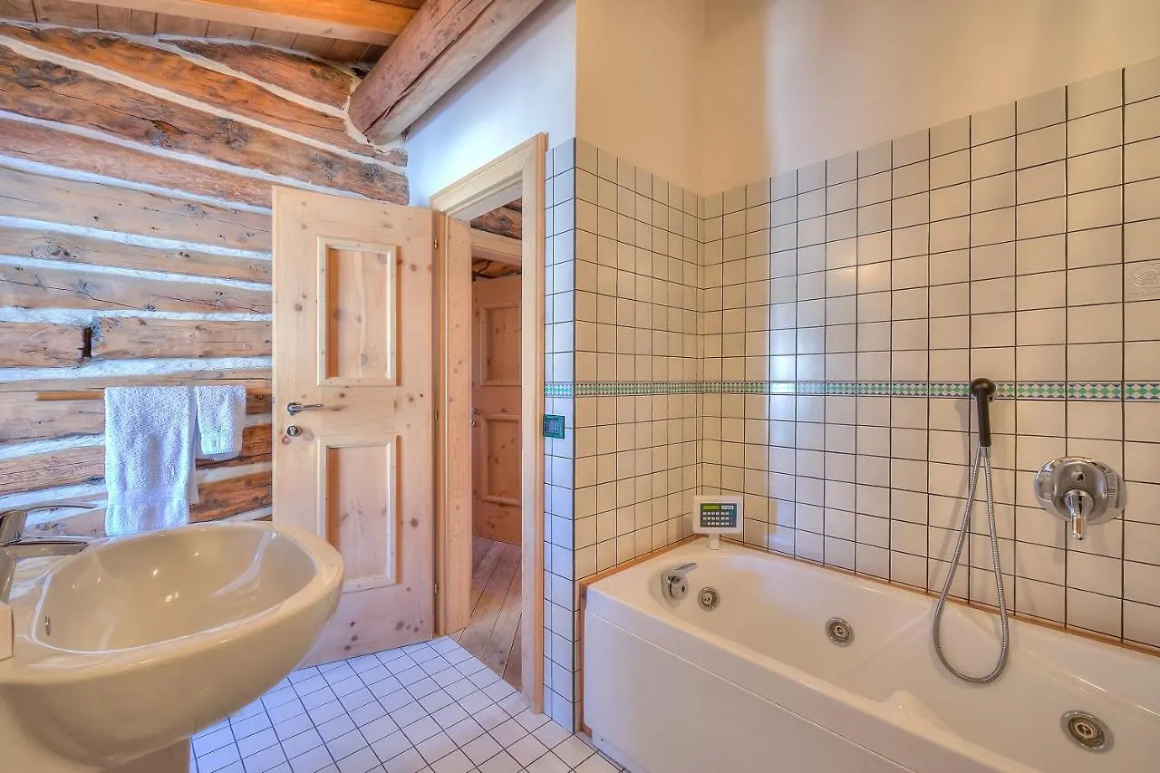 Chalet Lidia Ski In-Ski Out 50M - Happy Rentals Livigno Italy