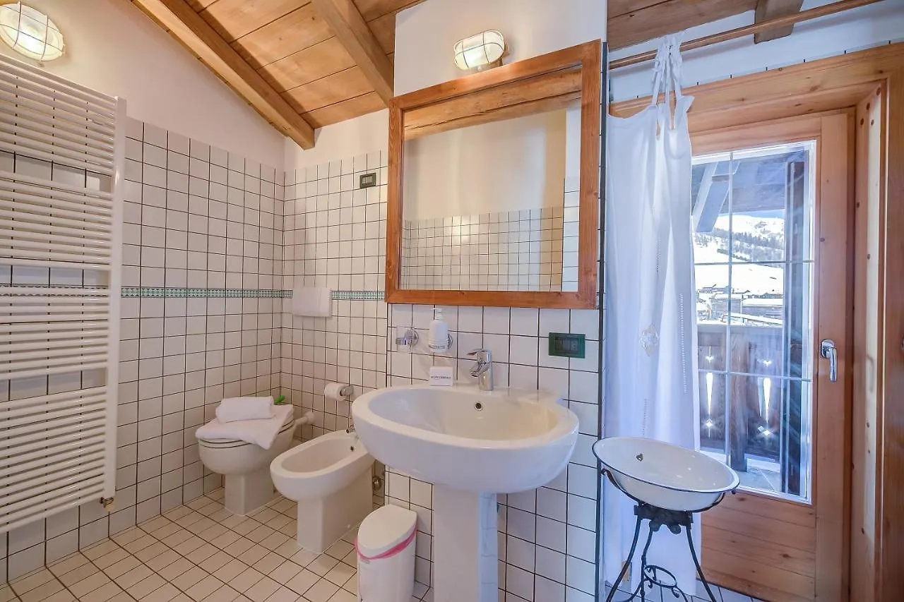 Chalet Lidia Ski In-Ski Out 50M - Happy Rentals Livigno 0*,  Italy